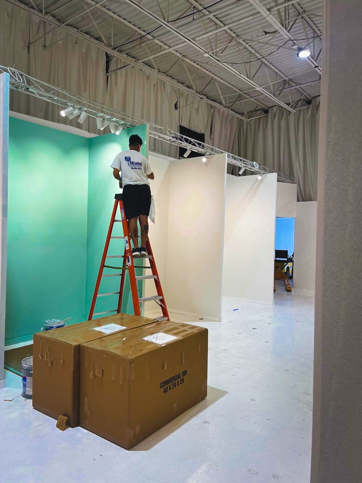 Home context, 2025 exhibition wall painting during build out